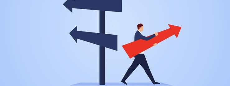 Businessman standing in the direction of the crossroads chose the direction