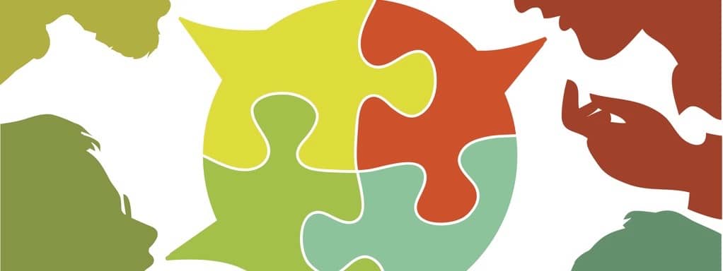 dialogue silhouettes of people leading dialogues with colorful speech bubbles. Speech bubbles in the form of puzzles. Dialogue and consensus.