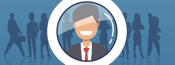 Man singled out from others by magnifying glass